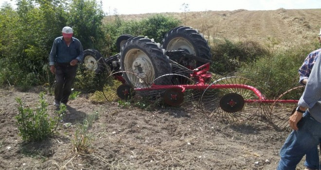 Traktõrún Altında kaldı